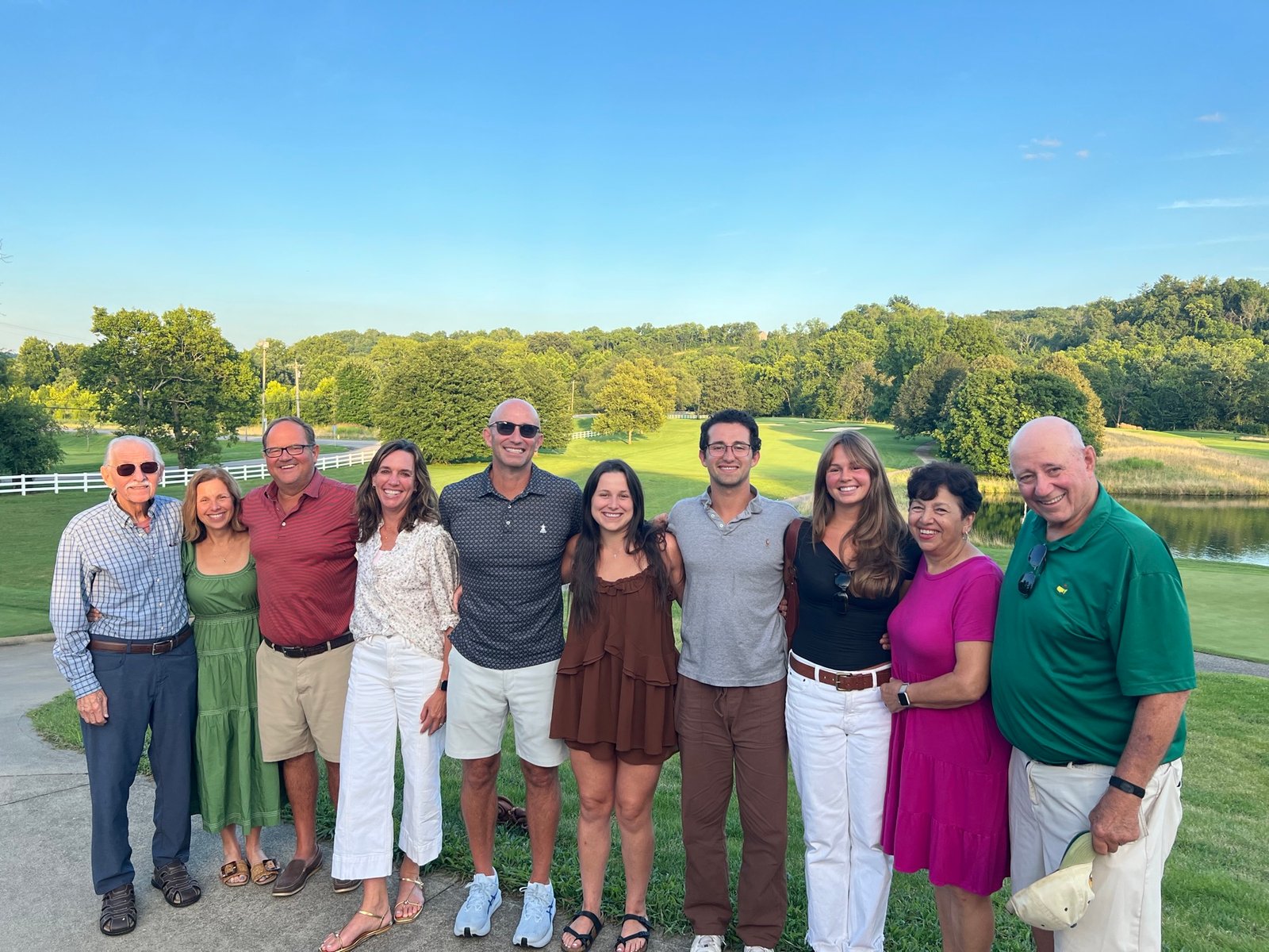 The Baked by Brown Butter family together on a golf course at golden hour